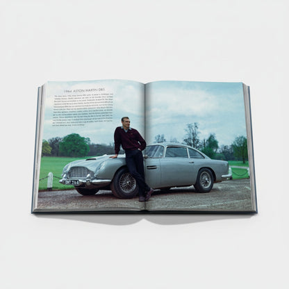 Shop Rescue Spa 1964 Aston Martin DB5 book featuring Sean Connery leaning on the car. Silk hardcover, 312 pages.