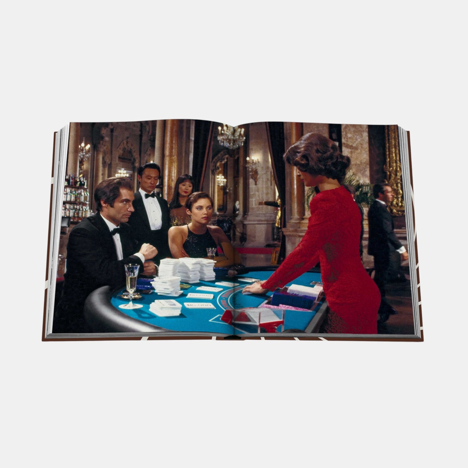 Shop Rescue Spa James Bond Style hardcover book open to a page showing a casino scene from a 007 film.