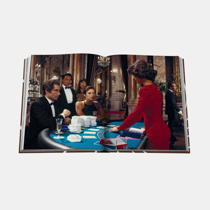 Shop Rescue Spa James Bond Style hardcover book open to a page showing a casino scene from a 007 film.