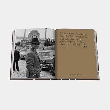 Shop Rescue Spa James Bond Style book open to a page featuring Sean Connery in a suit and a quote by Dylan Jones.