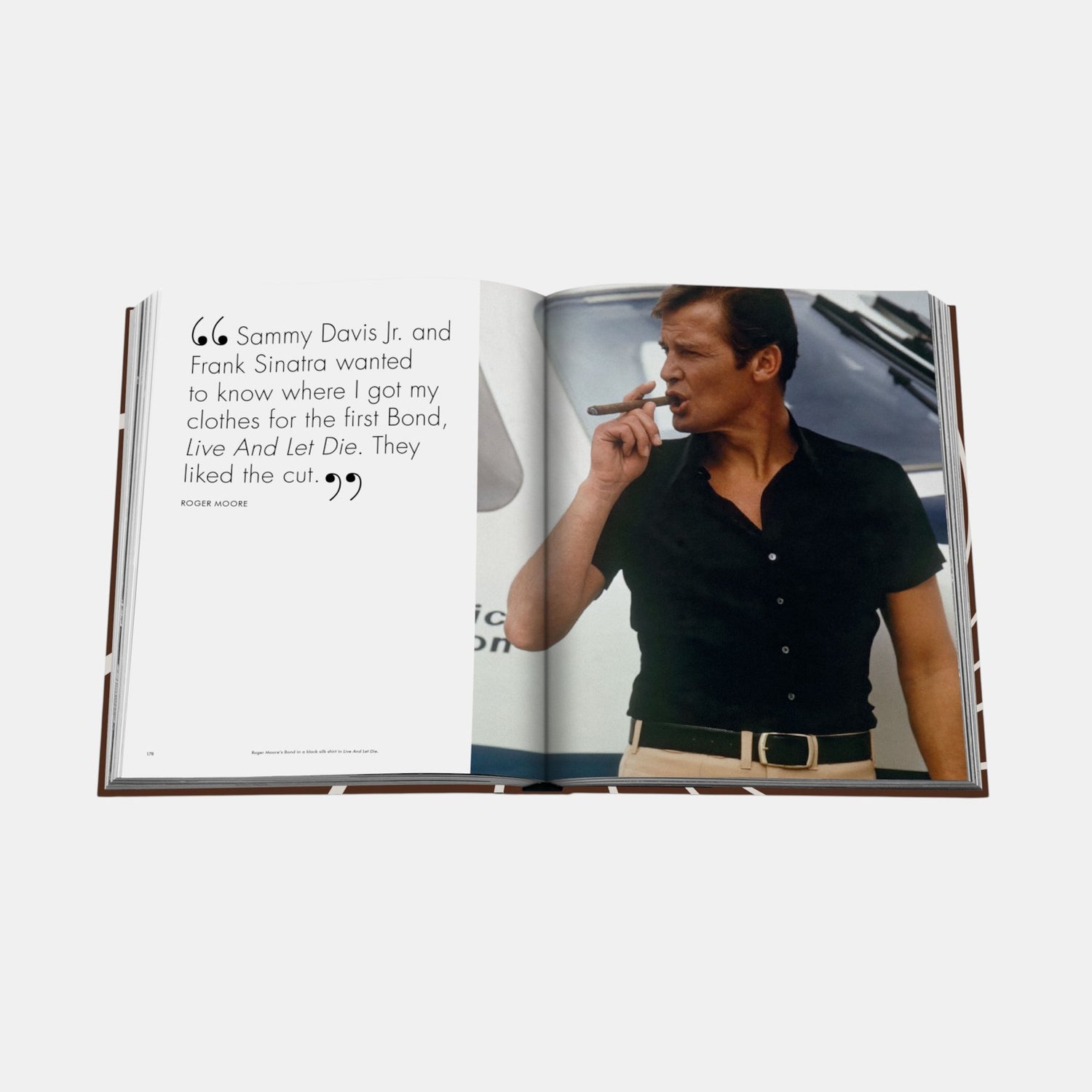 Shop Rescue Spa James Bond Style book open to a page featuring Roger Moore in a black shirt from Live And Let Die
