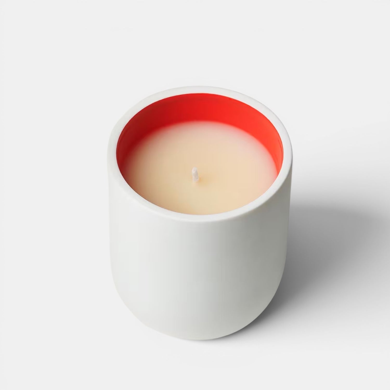 Shop Rescue Spa Jurassic Flower scented candle in matte white porcelain with a bright red interior, magnolia fragrance.