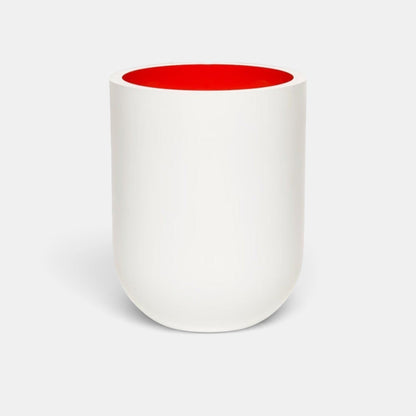Shop Rescue Spa Jurassic Flower scented candle in a matte white porcelain vessel with a vibrant red interior.