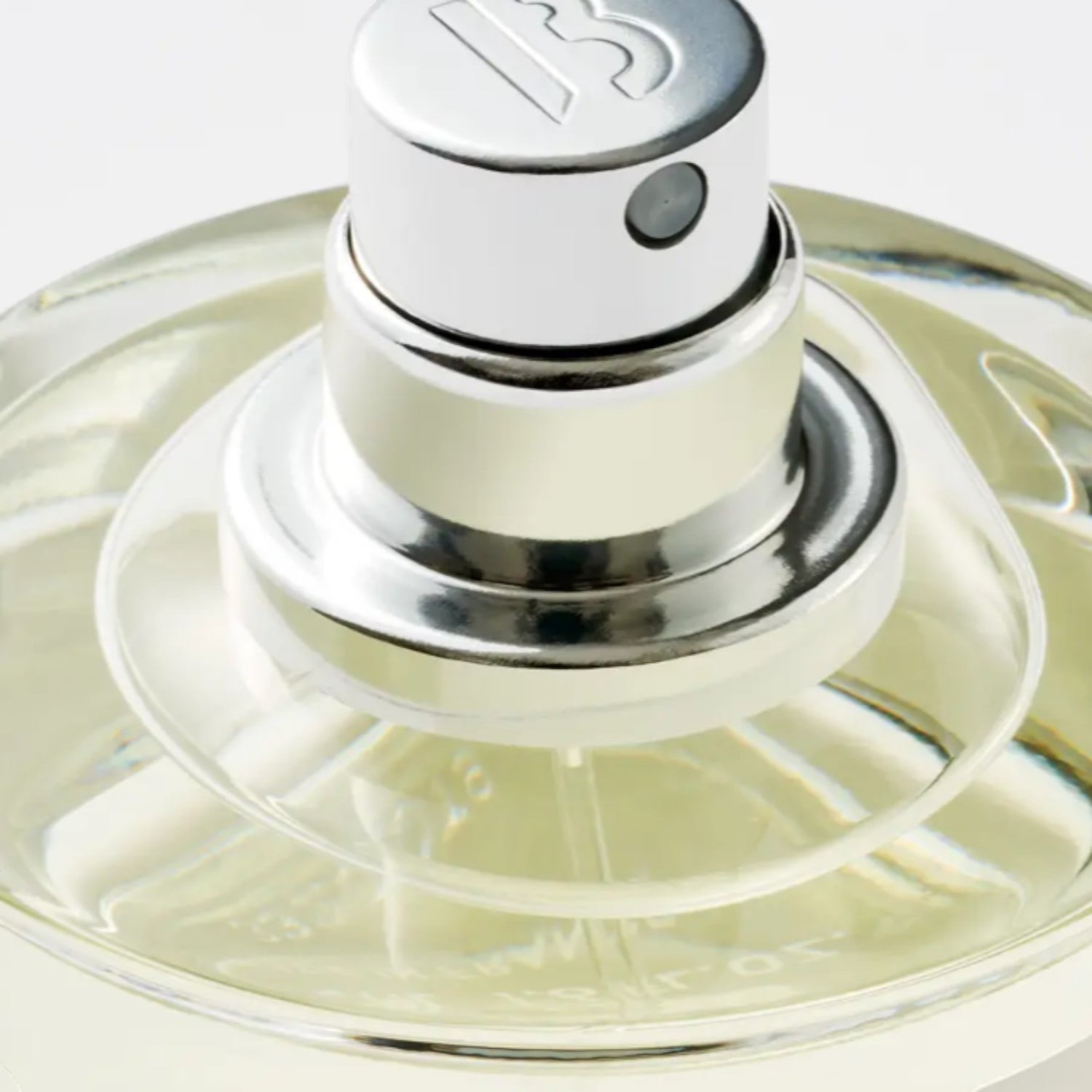 Shop Rescue Spa La Tulipe Eau De Parfum, a clear glass bottle with a silver spray nozzle and cap.