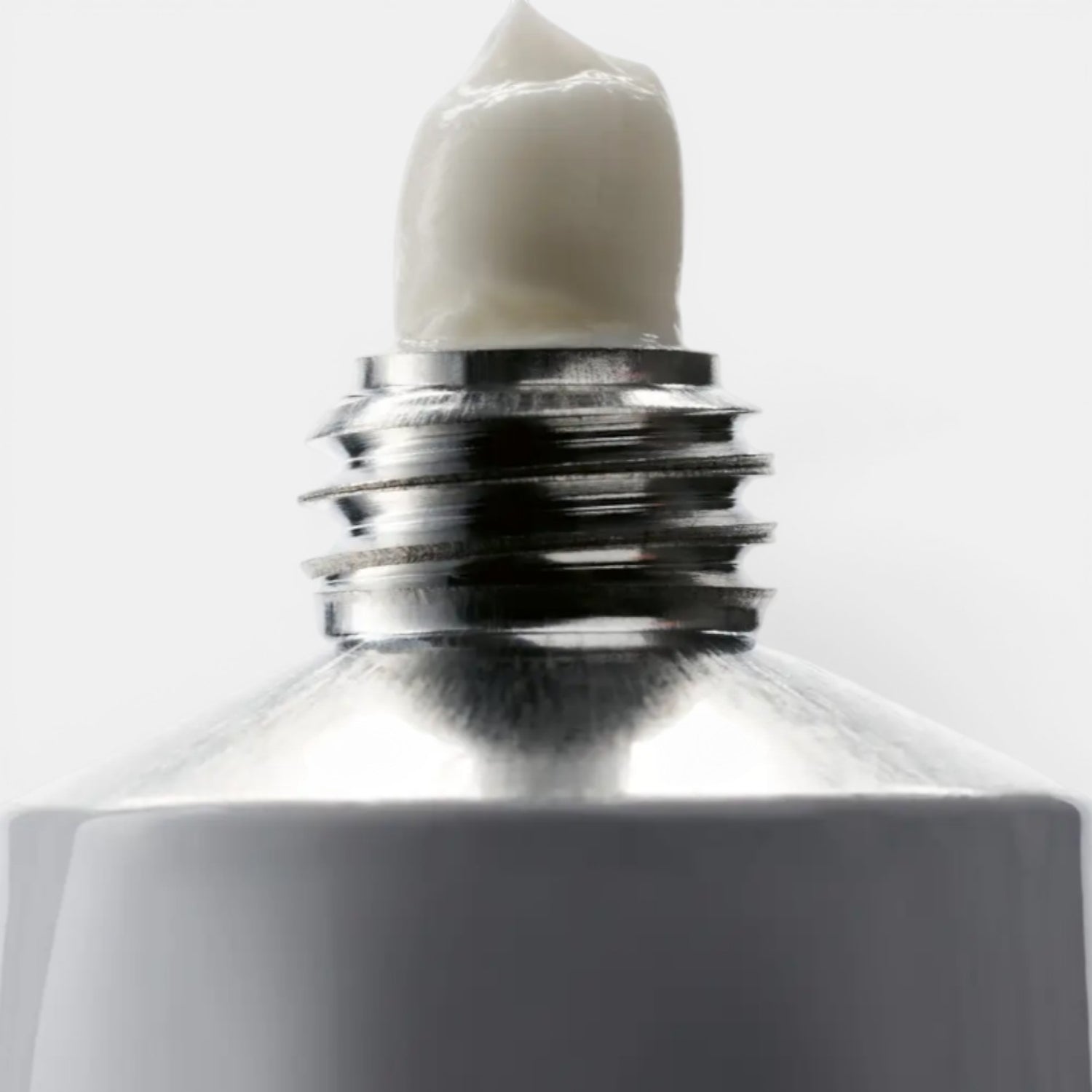 Shop Rescue Spa La Tulipe hand cream in a travel-sized tube, white cream dispensed.