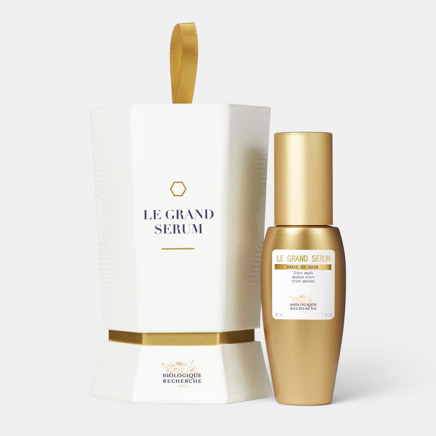 Shop Rescue Spa Le Grand Serum bottle and white hexagonal gift box for hydrating and radiance-boosting skincare.