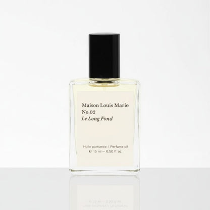 Shop Rescue Spa No.02 Le Long Fond perfume oil with hinoki wood, cedarwood, patchouli, and amber notes.