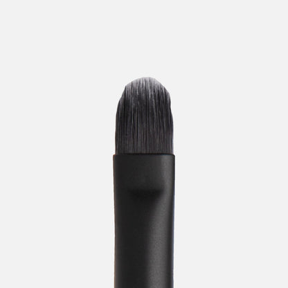 Shop Rescue Spa Westman Atelier lip brush with a wide, tapered head made of soft, cruelty-free nylon fibers.