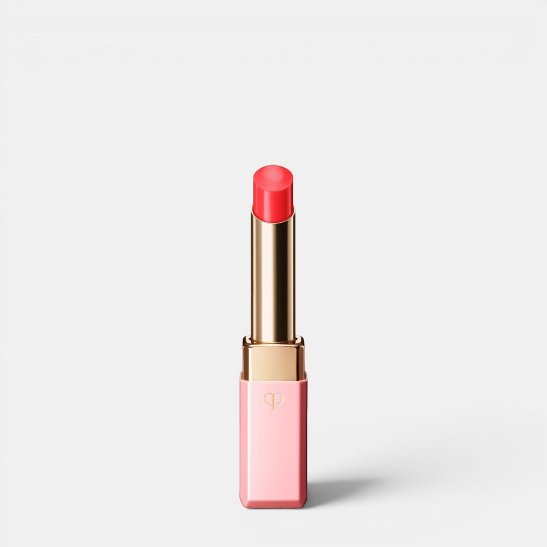 Shop Rescue Spa Lip Glorifier tinted lip balm in coral pink, hydrating and smoothing for a dewy glow.