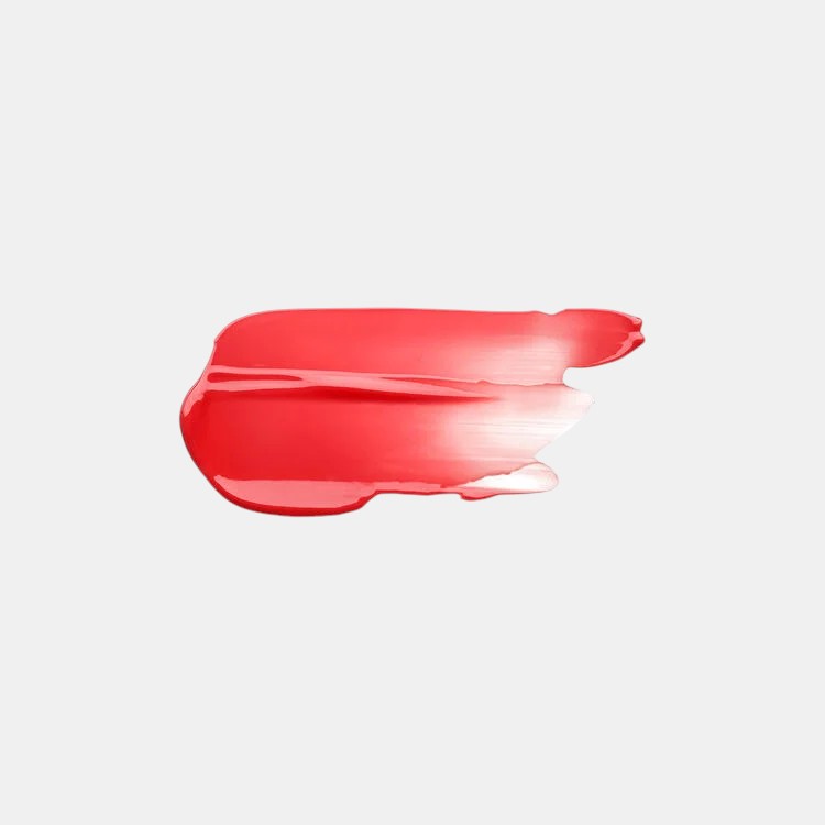 Shop Rescue Spa Lip Glorifier tinted lip balm swatch in sheer coral pink with a glossy finish.