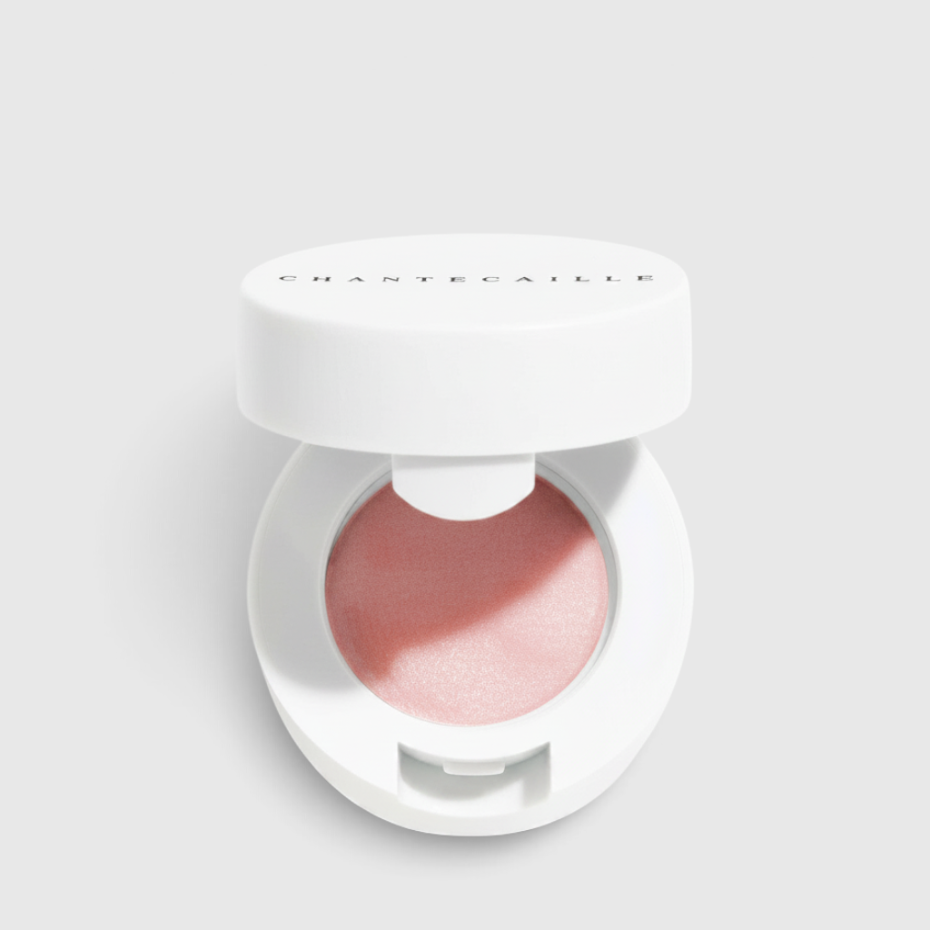 Shop Rescue Spa Lip Potion in a white compact with a soft pink, nourishing balm for hydrated and smooth lips.