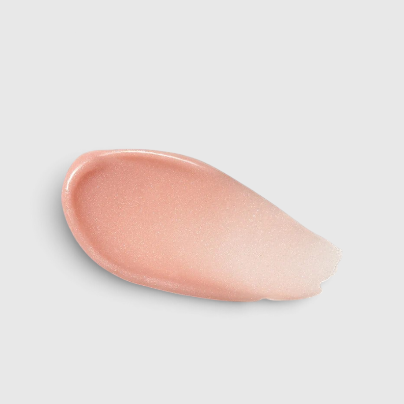 Shop Rescue Spa Lip Potion swatch showing a shimmering, light pink moisturizing lip balm texture.