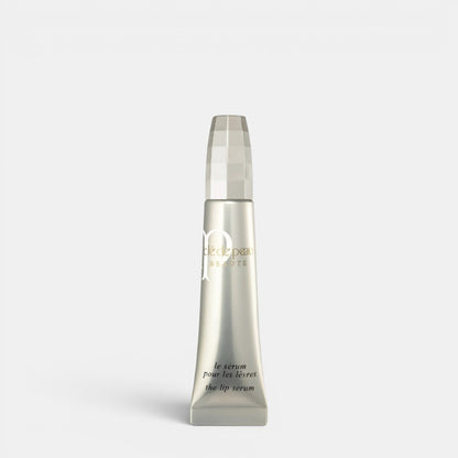 Shop Rescue Spa silver tube lip serum with a faceted cap, promoting plump, hydrated lips.