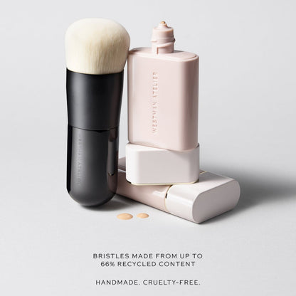 Shop Rescue Spa Liquid Blender Brush with cruelty-free polyester bristles next to Westman Atelier foundation bottles.