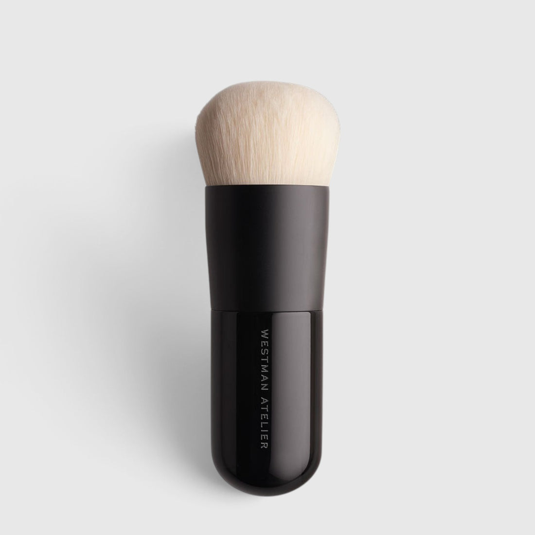 Shop Rescue Spa Liquid Blender Brush with soft cruelty-free bristles and a sleek black handle for makeup application.