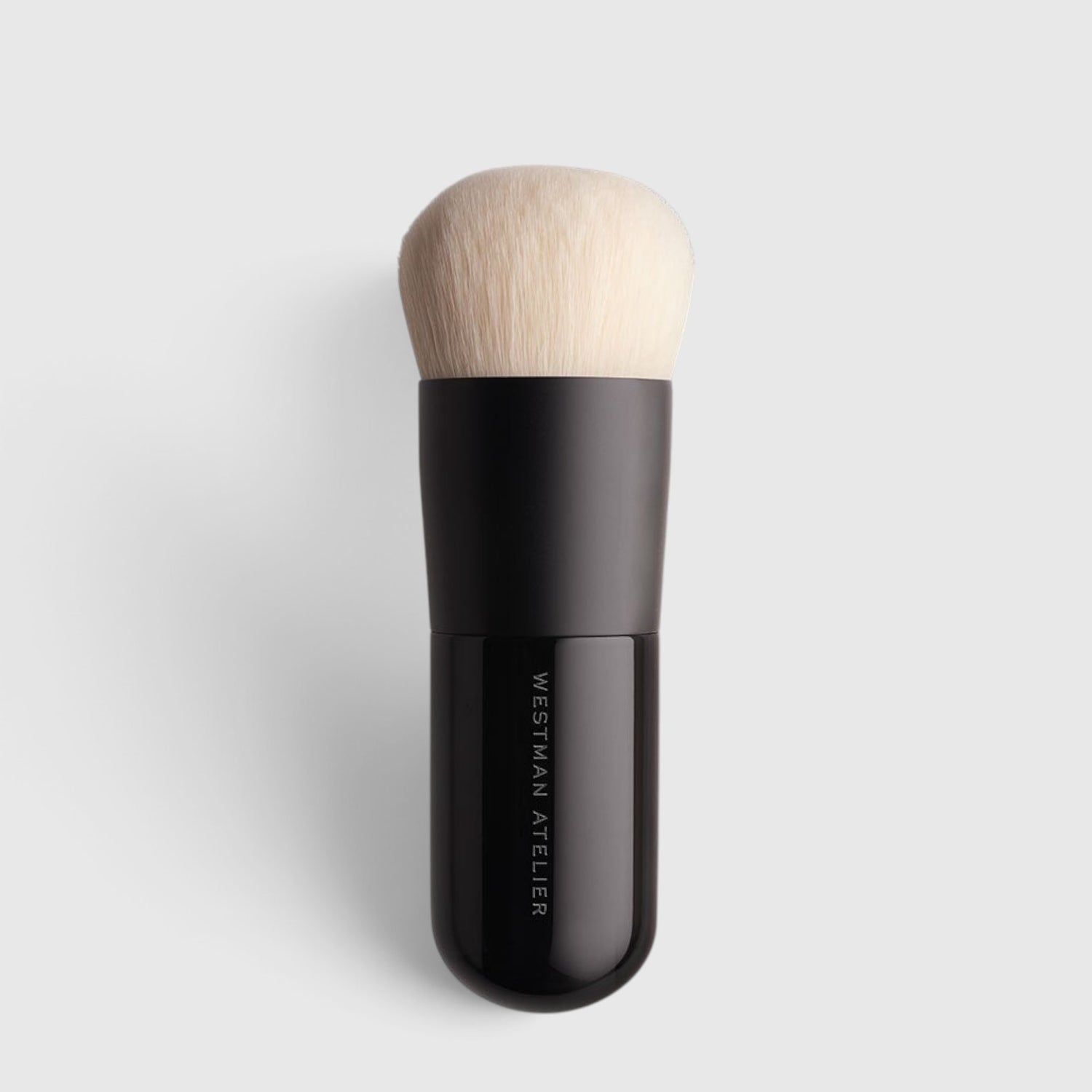 Shop Rescue Spa Liquid Blender Brush with soft cruelty-free bristles and a sleek black handle for makeup application.