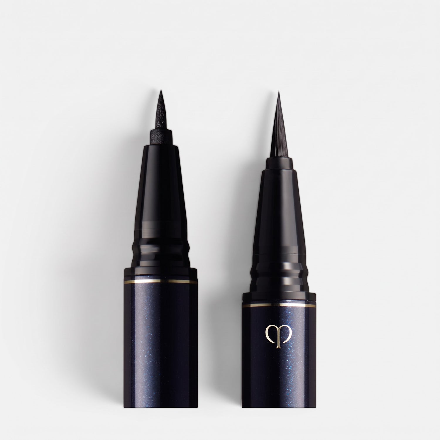 Shop Rescue Spa Intensifying Liquid Eyeliner with two distinct applicator tips for precise and bold eye definition.