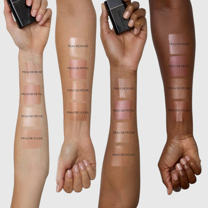 Shop Rescue Spa Liquid Super Loaded complexion enhancer swatches on four different skin tones showing three shades.