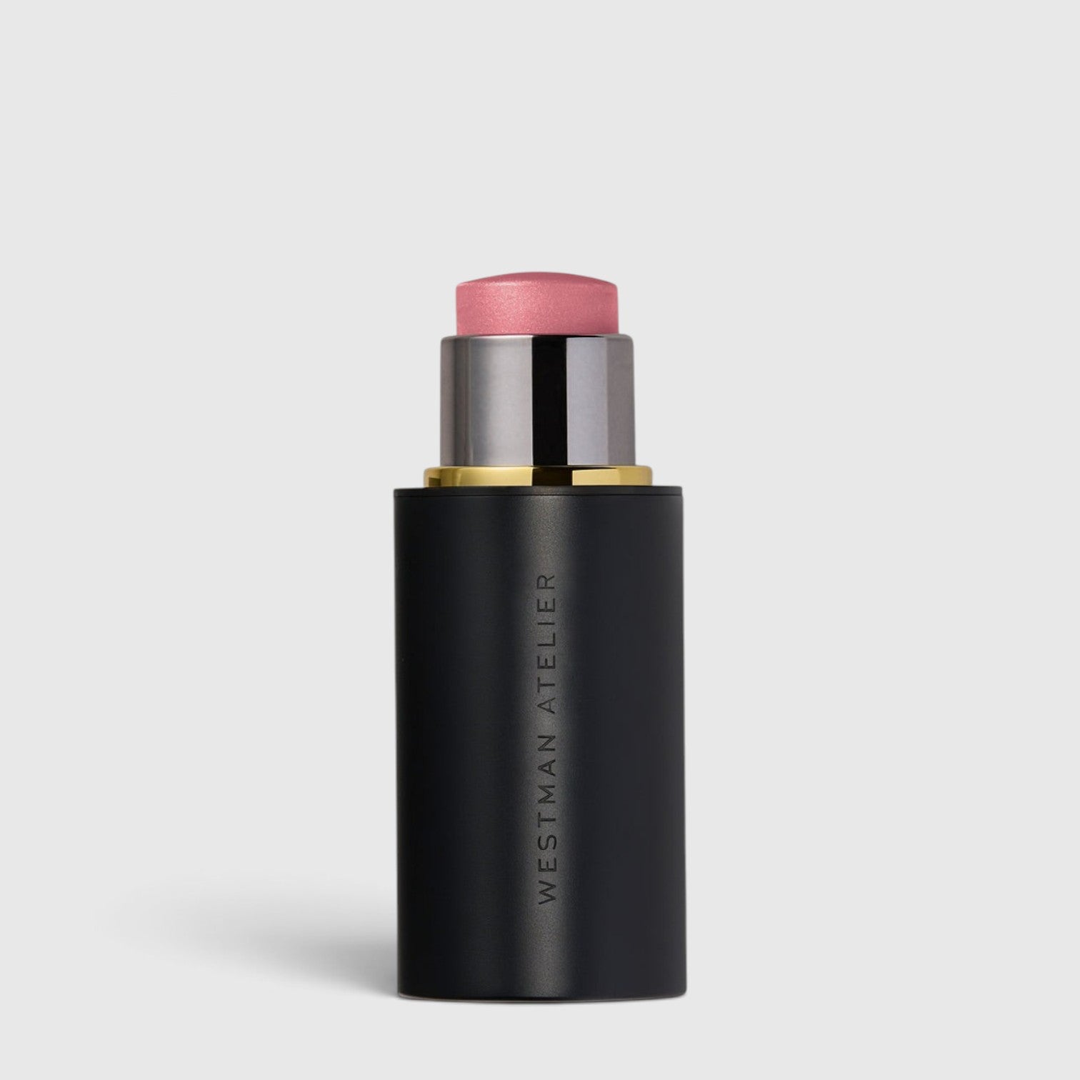 Shop Rescue Spa Lit Up Highlight Stick in a sleek black twist-up tube with a radiant pink-toned gel highlighter.