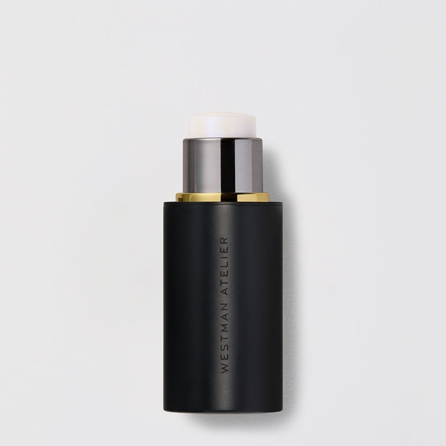 Shop Rescue Spa Lit Up Highlight Stick in a sleek black twist-up tube for a radiant, translucent skin finish.