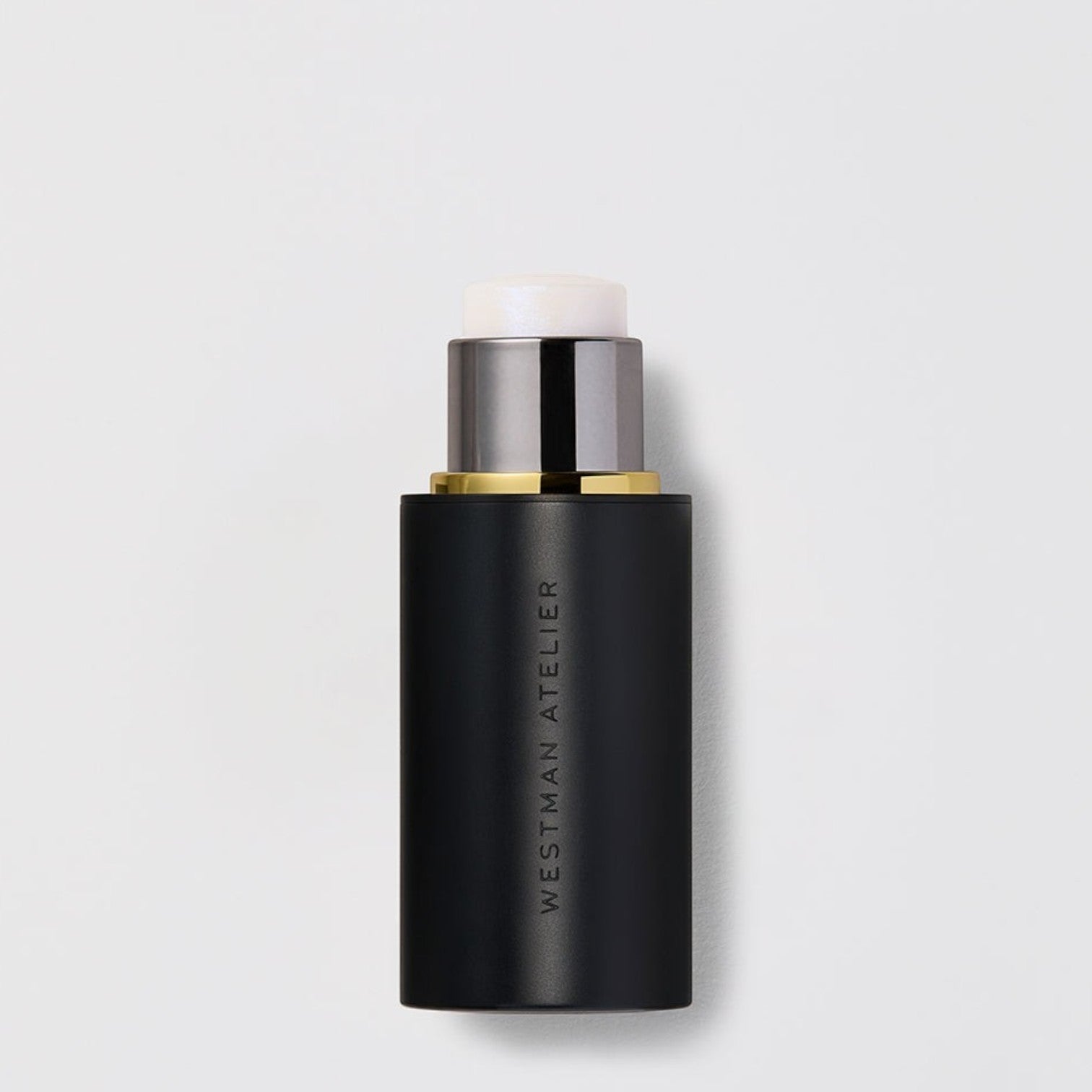Shop Rescue Spa Lit Up Highlight Stick in a sleek black twist-up tube for a radiant, translucent skin finish.