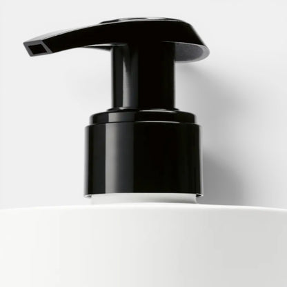 Shop Rescue Spa Lost Rose Hand Lotion with black pump dispenser and white bottle. Notes of rose, raspberry, pink pepper.