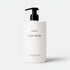 Shop Rescue Spa Lost Rose hand lotion in a white 450mL pump bottle with floral notes of rose and pink pepper.