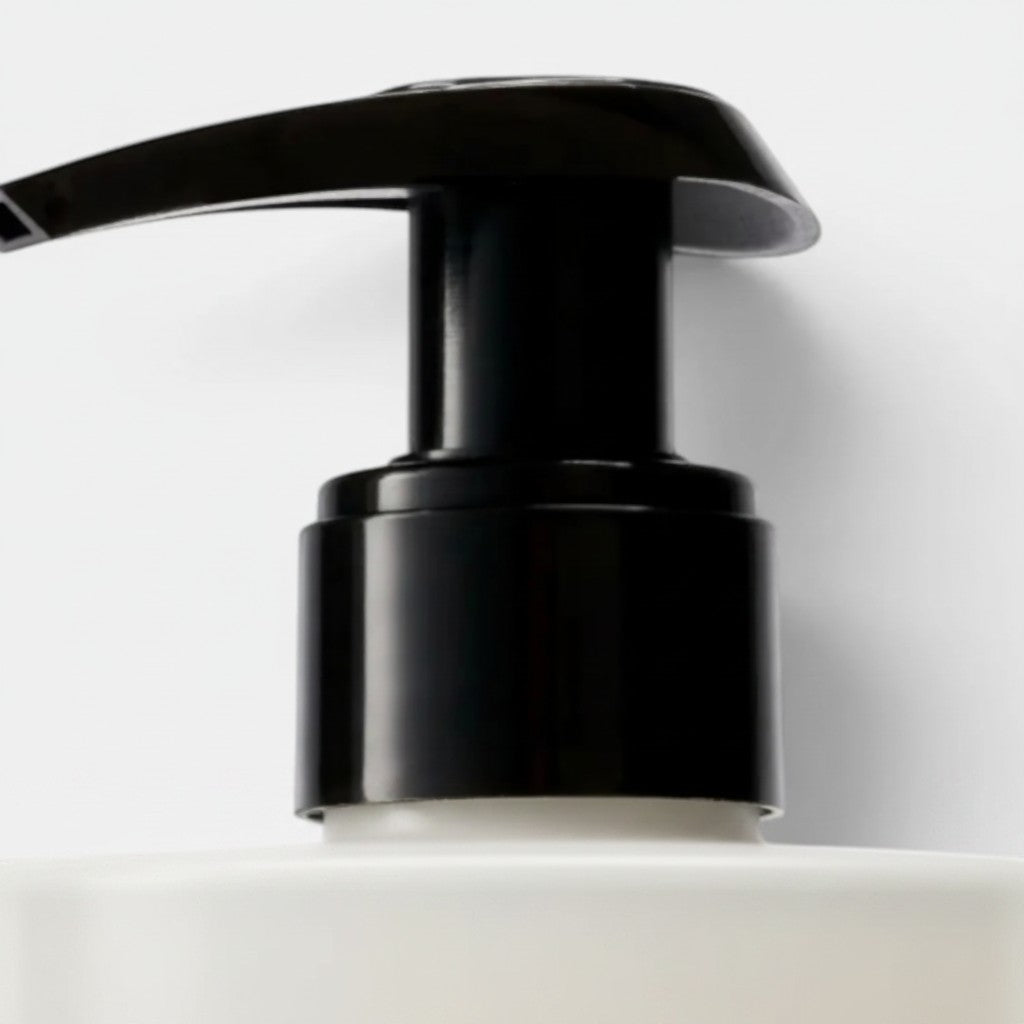 Shop Rescue Spa Lost Rose Hand Wash with black pump dispenser. Gentle cleansing formula with rose, raspberry, magnolia, and musk scents.
