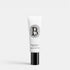 Shop Rescue Spa Luxurious Hand Balm in a white 45ml tube with black cap, featuring apricot and almond scent notes.