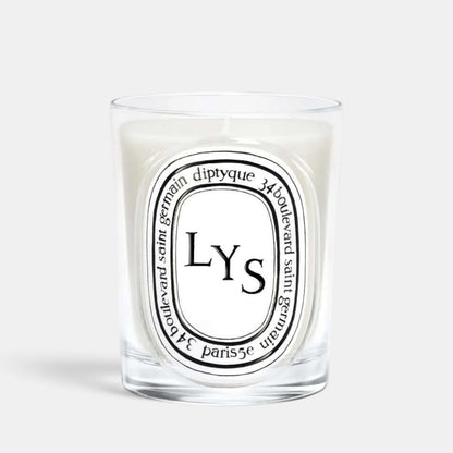 Shop Rescue Spa Lys scented candle in a clear glass vessel with a white wax floral fragrance
