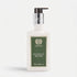 Shop Rescue Spa Magnolia Bloom hand and body moisturizer in a clear pump bottle with a green label