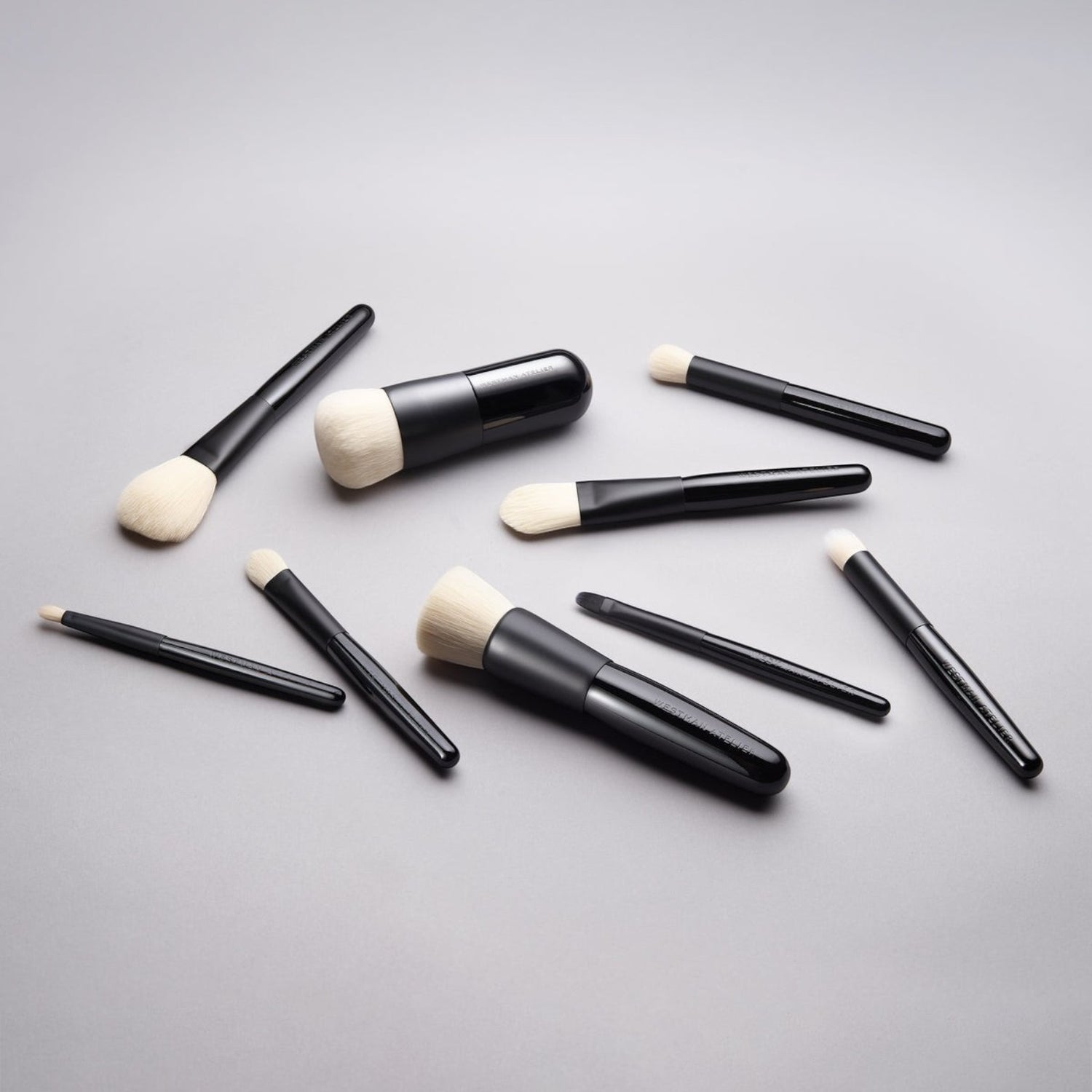 Shop Rescue Spa professional makeup brush set with black lacquered handles and soft white cruelty-free nylon bristles