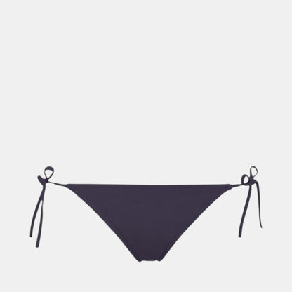 Shop Rescue Spa MALOU bikini bottom in dark purple with adjustable side ties and textured fabric.