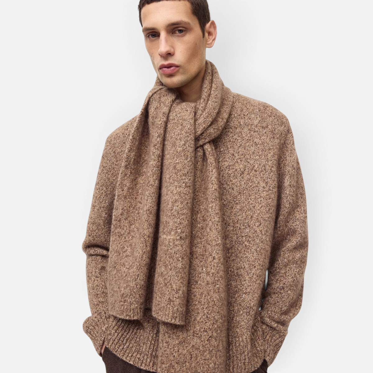 Shop Rescue Spa marled brown cashmere and silk knit scarf worn by a model in a matching sweater