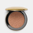 Shop Rescue Spa Beauty Butter Powder Bronzer in a round gold compact with a heart-embossed matte brown powder.