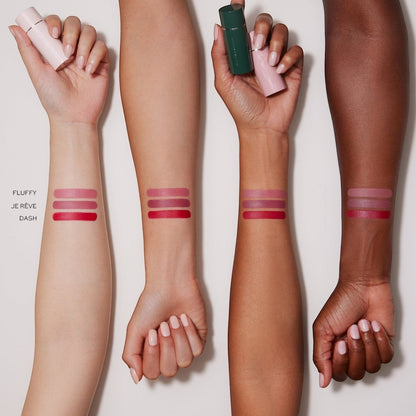 Shop Rescue Spa Lip Suede Matte Lipstick Trio swatches on four different skin tones showing Fluffy, Je Rêve, and Dash.