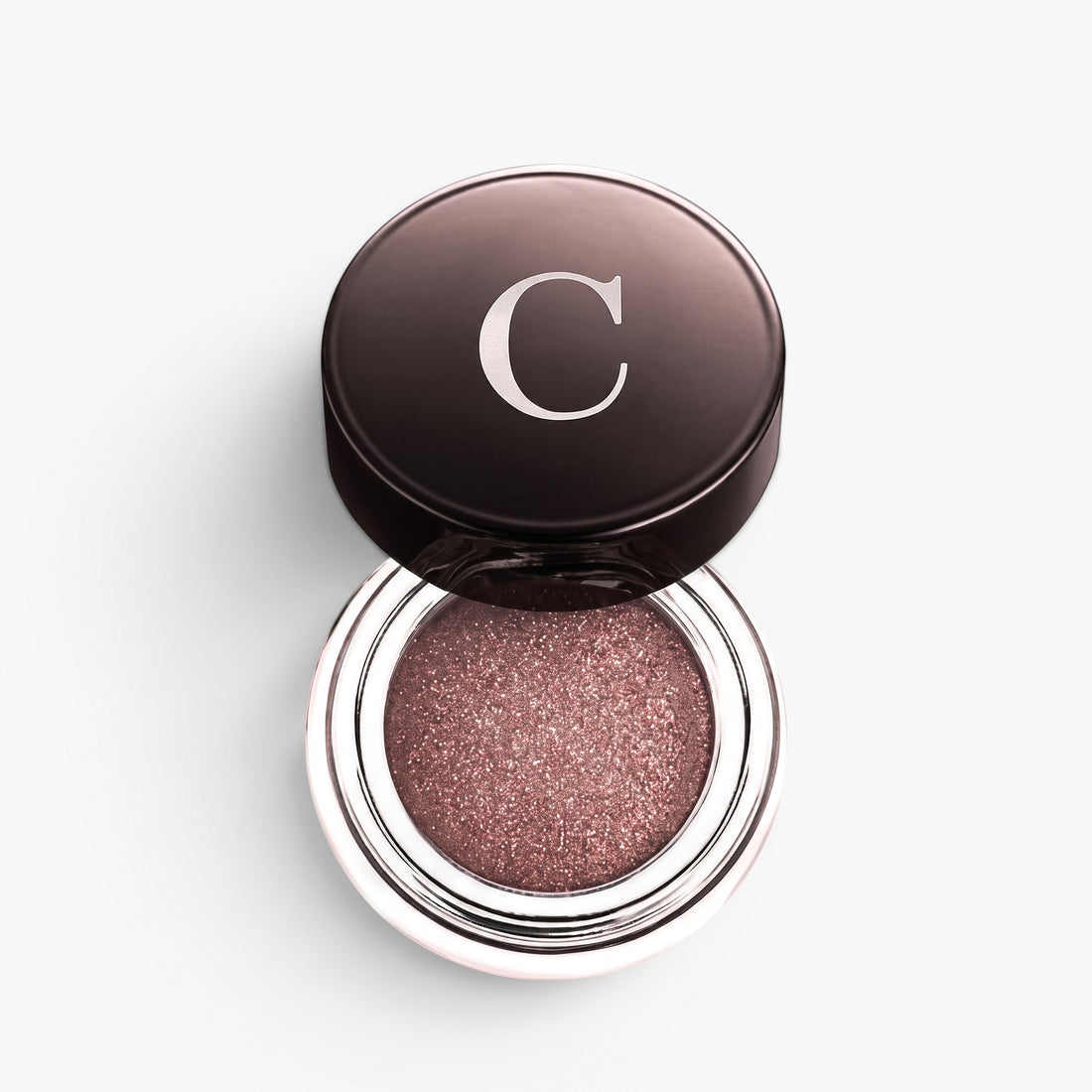 Shop Rescue Spa Mermaid Eye Color in a shimmering metallic rose gold shade with a sleek black jar and lid.