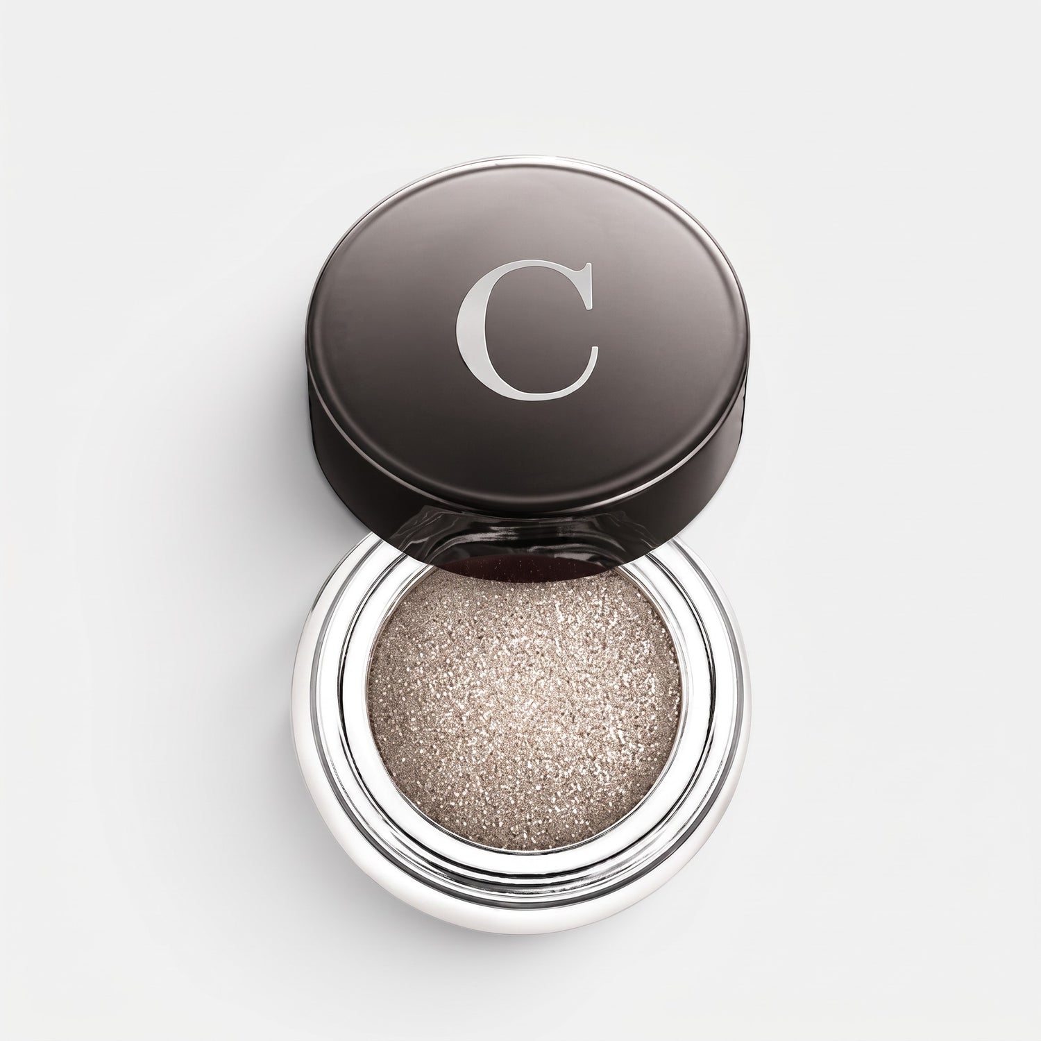 Shop Rescue Spa Mermaid Eye Color in a shimmering metallic champagne shade with a creamy, long-wearing formula.