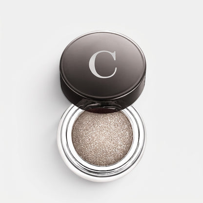 Shop Rescue Spa Mermaid Eye Color in a shimmering metallic champagne shade with a creamy, long-wearing formula.