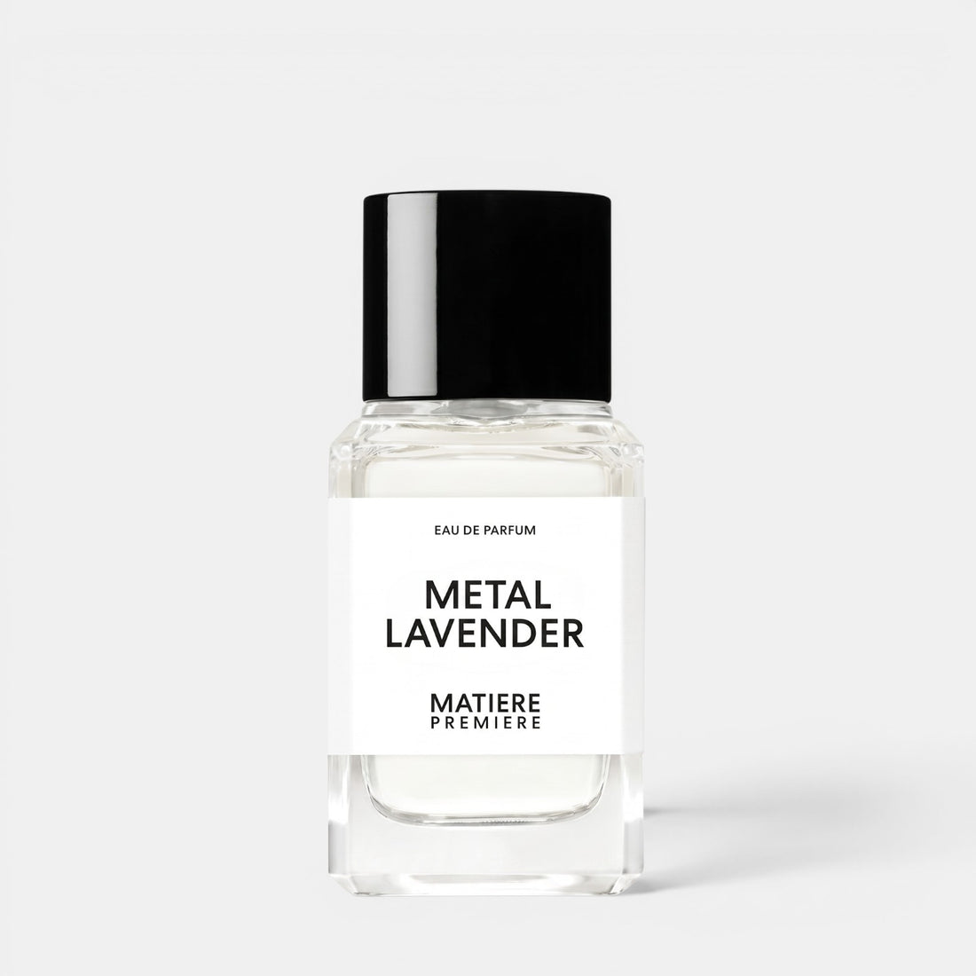 Shop Rescue Spa Metal Lavender eau de parfum in a clear glass bottle with a black cap against a white background.