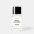Shop Rescue Spa Metal Lavender eau de parfum in a clear glass bottle with a black cap against a white background.