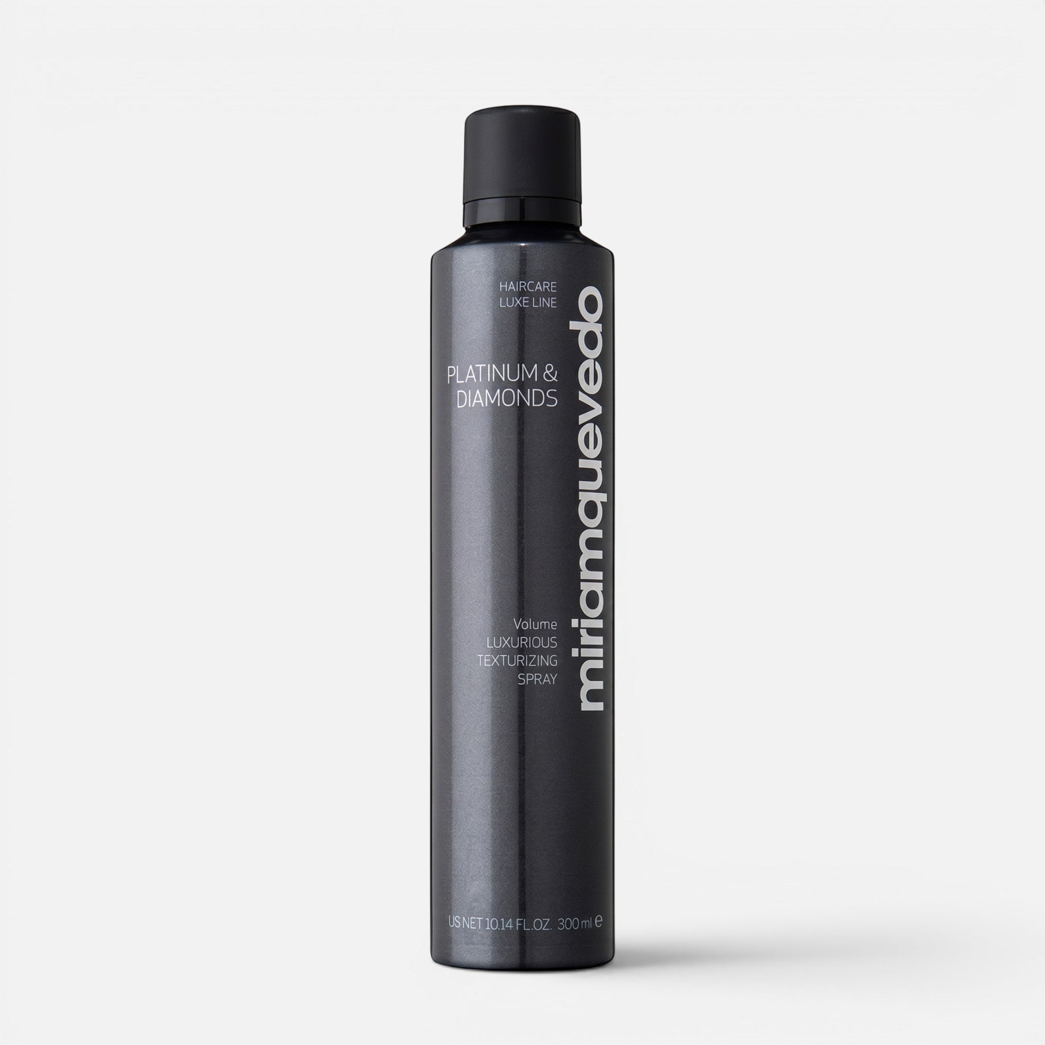Shop Rescue Spa miriam quevedo Platinum &amp; Diamonds Luxurious Texturizing Spray in a sleek dark grey 300ml bottle.