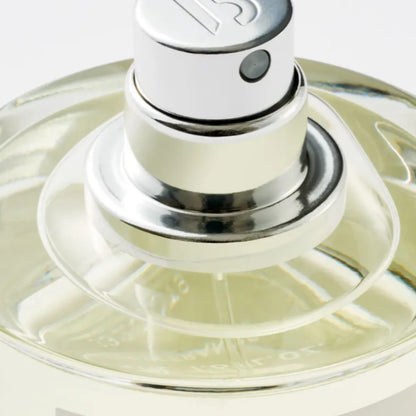 Shop Rescue Spa Mixed Emotions Eau de Parfum, a clear liquid with silver accents on the spray nozzle.