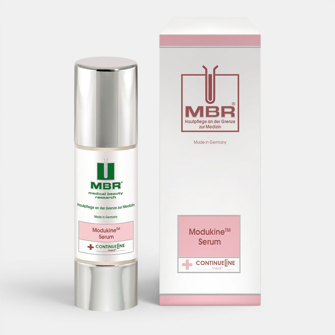 Shop Rescue Spa Modukine Serum in an airless pump bottle with its matching white and pink product box.