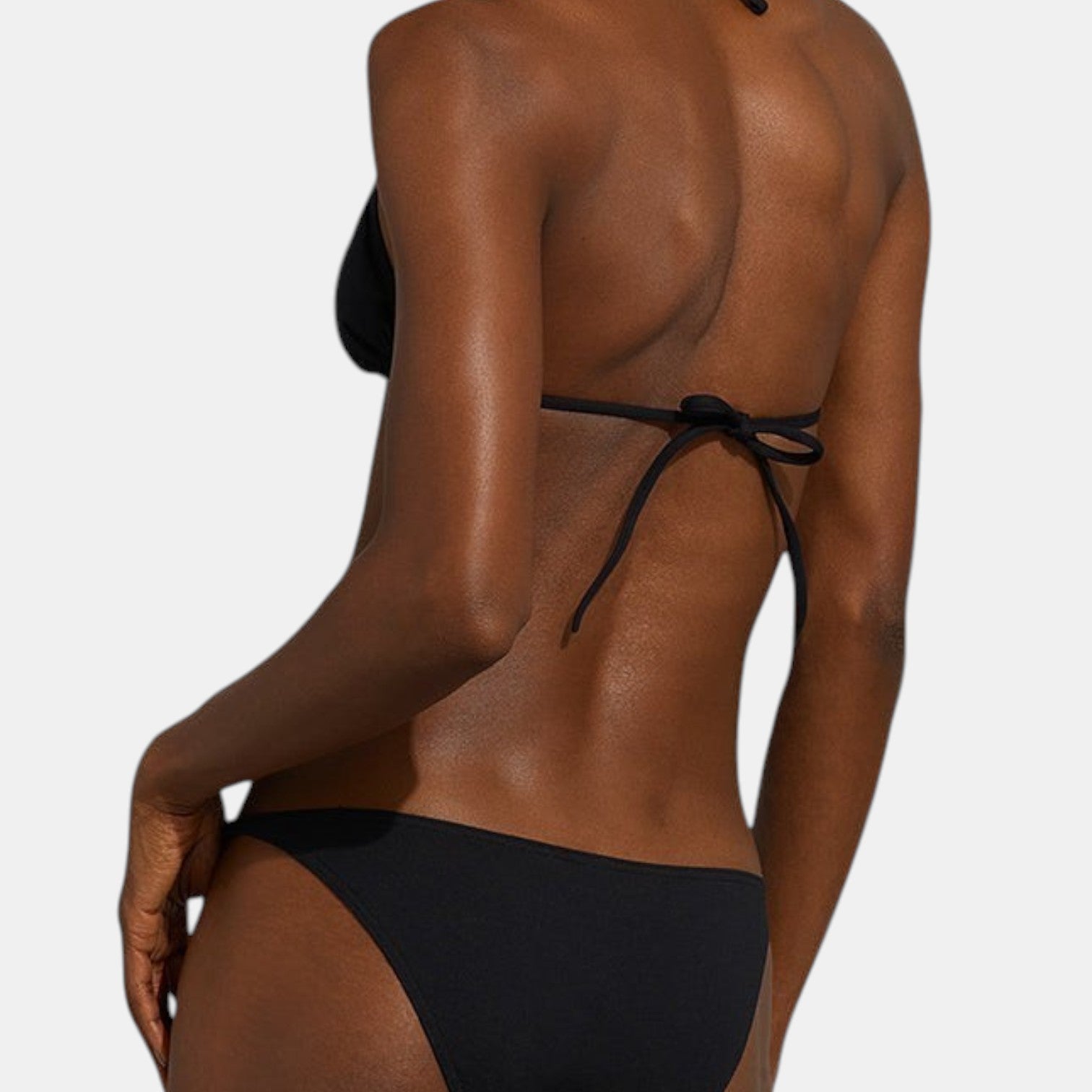 Shop Rescue Spa MOUNA black minimal coverage triangle bikini top with adjustable spaghetti straps on a model