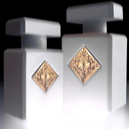 Shop Rescue Spa Musk Therapy Extrait De Parfum, white bottles with gold ornate detail. Unisex.