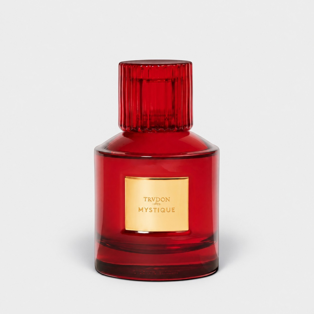Shop Rescue Spa Mystique Parfum in a deep red glass bottle with a gold label and ribbed cap