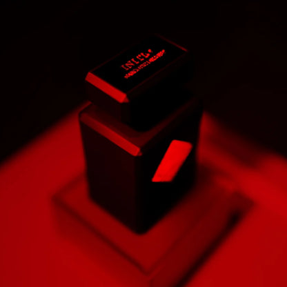 Shop Rescue Spa Narcotic Delight Eau De Parfum 90ml bottle with red lighting, featuring notes of cherry, cognac, and vanilla.