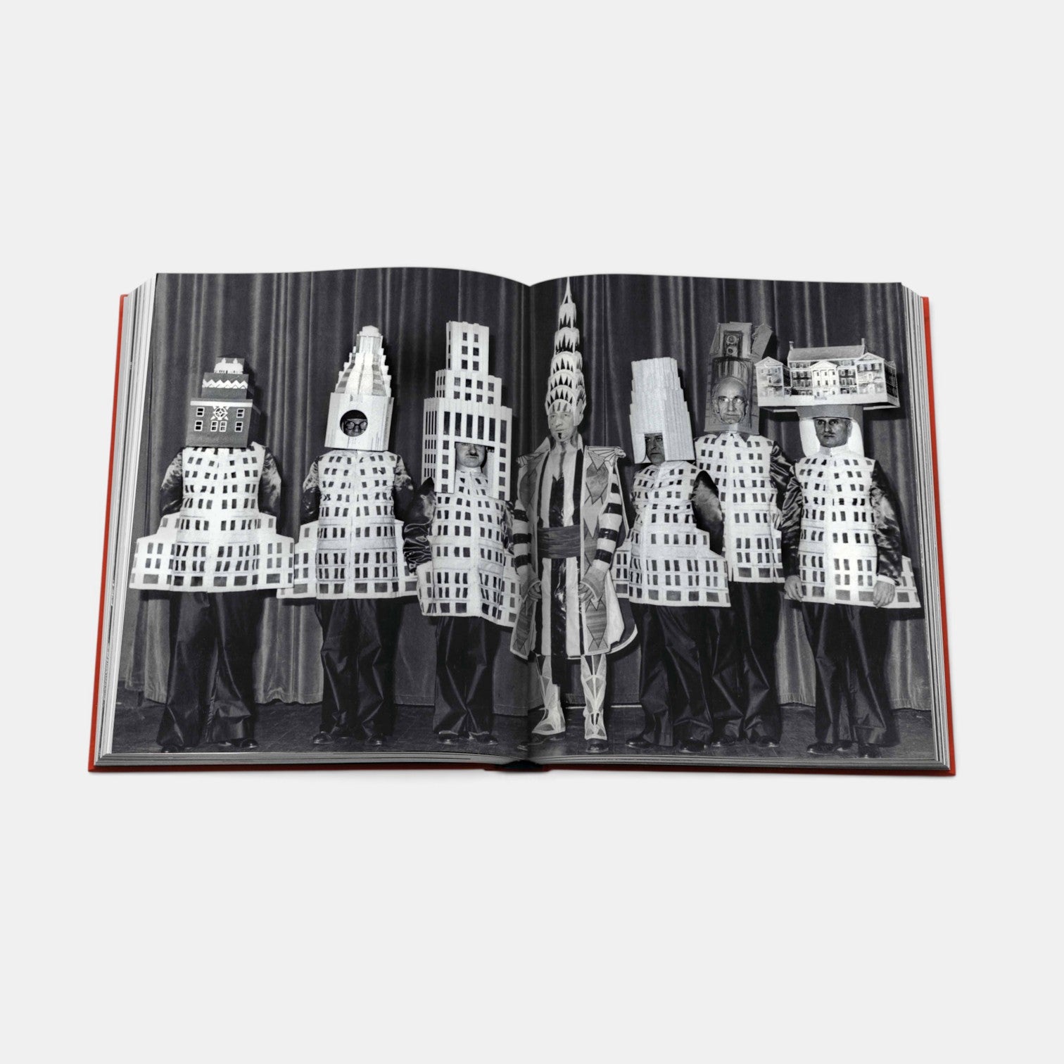 Shop Rescue Spa New York By New York book open to a black and white photo of people in skyscraper costumes
