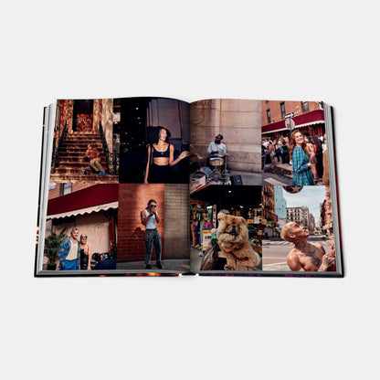 Shop Rescue Spa New York Chic coffee table book open to a spread featuring vibrant street photography of NYC life